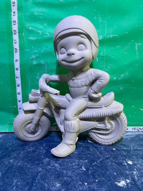 A 693 - BOY MOTORCYCLIST