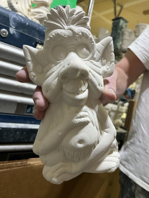TROLL WITH ARMS OVER BELLY