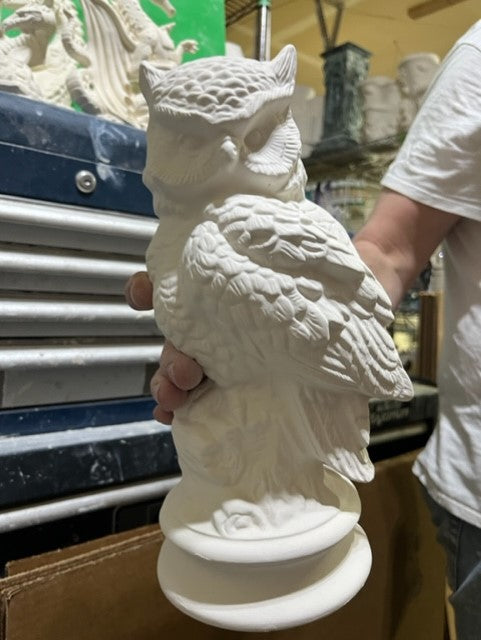 OWL ON PEDESTAL