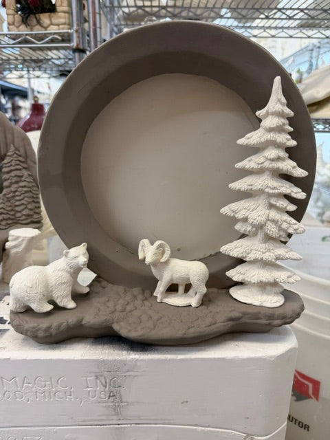 frame with tree, sheep and bear