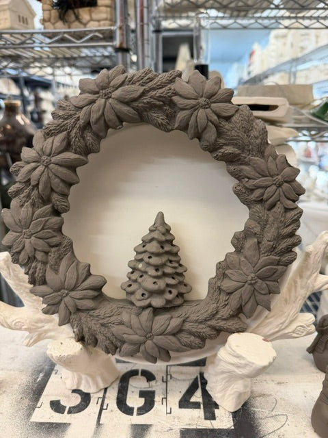 Poinsettia wreath with Christmas tree