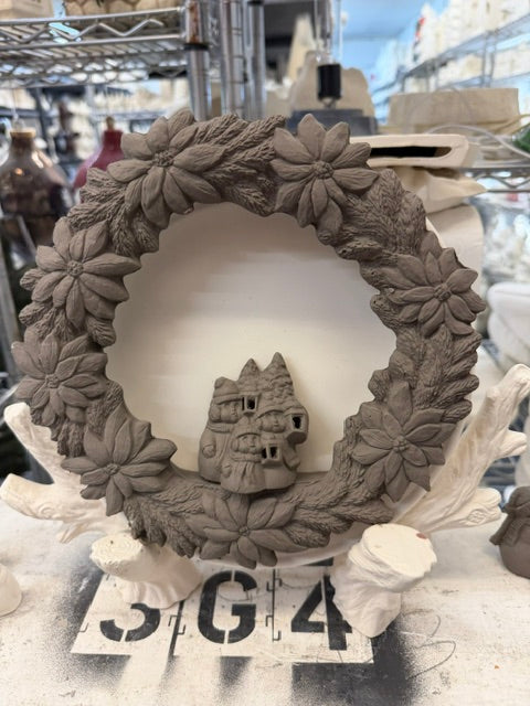 Poinsettia wreath with snow people