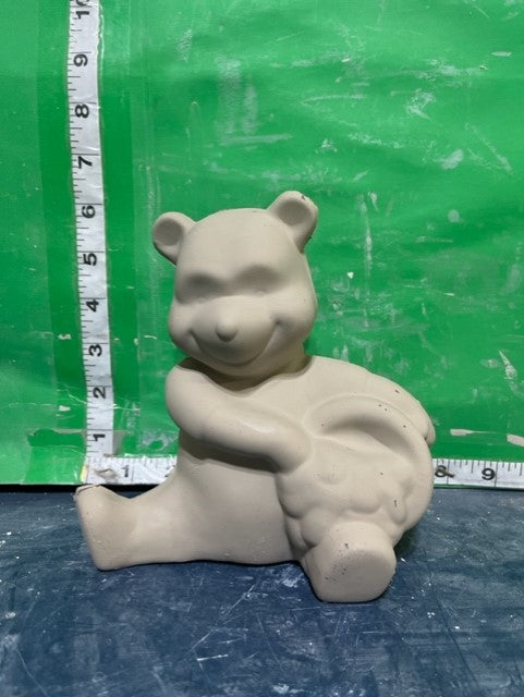 SITTING WINNIE THE POOH