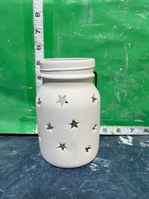 MASON JAR WITH STAR CUTOUTS
